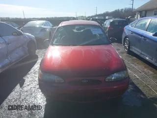 1999 Ford Escort SE with VIN 1FAFP13P6XW180845, listed as a IAAI auction lot 41398242 with 59,300 mi miles. Bid and sale history available at carsss.com. Image 12.