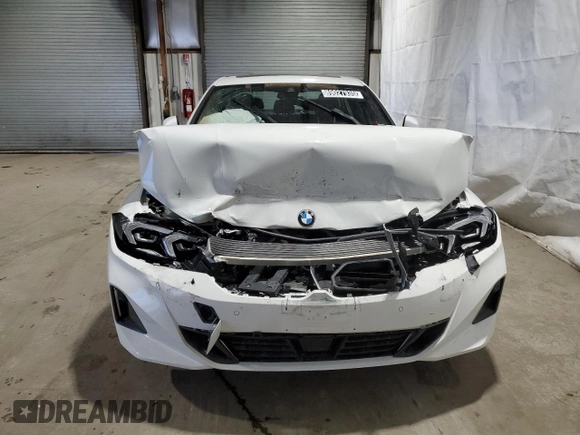 2025 BMW 3 Series 330i xDrive with VIN 3MW89CW02S8F00975, listed as a Copart auction lot 89027935 with 3,667 mi miles and Salvage Title. Bid and sale history available at carsss.com. Image 5.