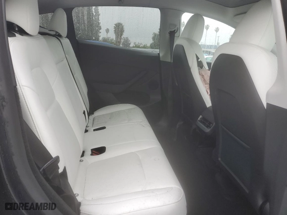 2024 Tesla Model Y with VIN 7SAYGDED5RF054851, listed as a Copart auction lot 42835055 with 14,695 mi miles and Salvage Title. Bid and sale history available at carsss.com. Image 12.