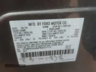 2023 Ford Edge SEL with VIN 2FMPK4J96PBA21713, listed as a Copart auction lot 54752655 with 0 mi miles and Salvage Title. Bid and sale history available at carsss.com. Image 14.