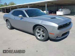 2015 Dodge Challenger SXT with VIN 2C3CDZAG2FH701021, listed as a IAAI auction lot 41986463 with 90,926 mi miles. Bid and sale history available at carsss.com. Image 1.
