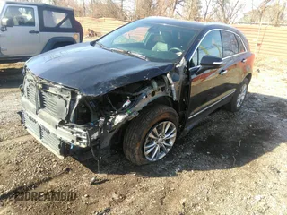 2022 Cadillac XT5 AWD Premium Luxury with VIN 1GYKNDR4XNZ164098, listed as a IAAI auction lot 41822372 with 32,644 mi miles and . Bid and sale history available at DreamBid. Image 18.