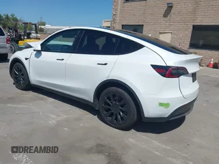 2023 Tesla Model Y Long Range with VIN 7SAYGDEE8PF612438, listed as a IAAI auction lot 41991145 with 29,775 mi miles and . Bid and sale history available at carsss.com. Image 3.
