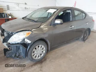 2014 Nissan Versa SV with VIN 3N1CN7AP6EL821104, listed as a IAAI auction lot 41773957 with 167,287 mi miles. Bid and sale history available at carsss.com. Image 2.