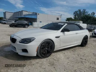 2017 BMW M6 z VIN WBS6G9C59HD932339, wystawiony jako Copart lot #76159614 z przebiegiem 81 987 mil mil oraz Nie do naprawy. Historia ofert i sprzedaży dostępna na DreamBid. Obrazek 1.