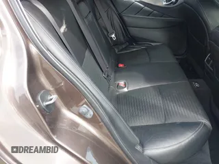 2014 Infiniti Q50 Premium z VIN JN1BV7AR0EM687810, wystawiony jako IAAI lot #42073610 z przebiegiem 167 912 mil mil oraz . Historia ofert i sprzedaży dostępna na DreamBid. Obrazek 8.