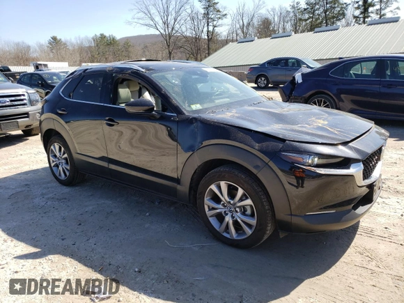 2023 Mazda CX-30 S Premium with VIN 3MVDMBDM0PM536225, listed as a Copart auction lot 48455505 with 29,617 mi miles and Salvage Title. Bid and sale history available at DreamBid. Image 4.
