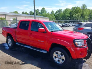 2007 Toyota Tacoma z VIN 5TELU42N87Z409472, wystawiony jako IAAI lot #42296644 z przebiegiem 302 162 mil mil oraz . Historia ofert i sprzedaży dostępna na DreamBid. Obrazek 1.