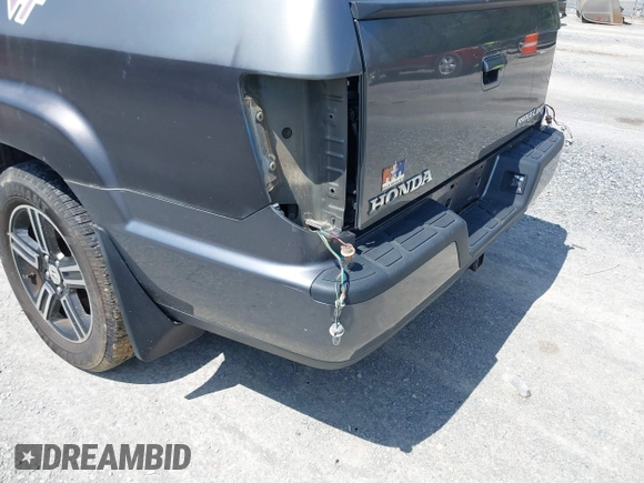 2009 Honda Ridgeline RTL with VIN 2HJYK16539H503533, listed as a IAAI auction lot 42040423 with 206,102 mi miles and . Bid and sale history available at DreamBid. Image 6.