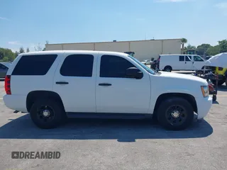 2011 Chevrolet Tahoe Commercial with VIN 1GNLC2E02BR325621, listed as a IAAI auction lot 41866389 with 167,693 mi miles and . Bid and sale history available at DreamBid. Image 13.