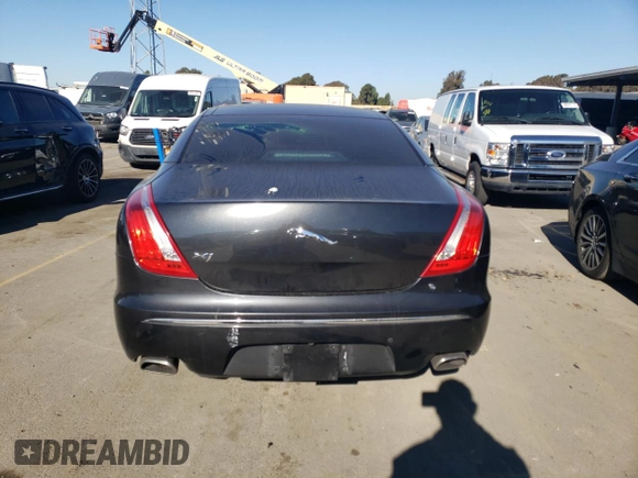 2012 Jaguar XJ with VIN SAJWA1CB7CLV33879, listed as a Copart auction lot 88708995 with Not provided miles and Salvage title. Bid and sale history available at DreamBid. Image 6.