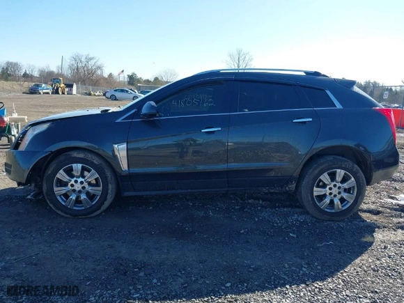 2015 Cadillac SRX Luxury Collection with VIN 3GYFNEE34FS630403, listed as a IAAI auction lot 41805162 with 143,000 mi miles. Bid and sale history available at carsss.com. Image 14.