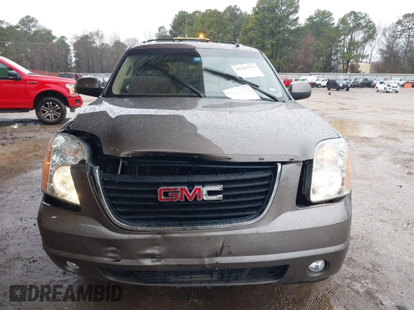 2014 GMC Yukon SLT with VIN 1GKS1CE00ER164663, listed as a IAAI auction lot 41547771 with 178,998 mi miles. Bid and sale history available at carsss.com. Image 6.