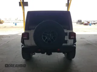 2021 Jeep Wrangler Unlimited Rubicon z VIN 1C4JJXFG5MW767036, wystawiony jako Copart lot #56918355 z przebiegiem 52 994 mil mil oraz Szkoda całkowita • Salvage title. Historia ofert i sprzedaży dostępna na DreamBid. Obrazek 6.