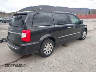 2014 Chrysler Town & Country Touring with VIN 2C4RC1BG4ER469409, listed as a IAAI auction lot 41919315 with 135,894 mi miles. Bid and sale history available at carsss.com. Image 4.