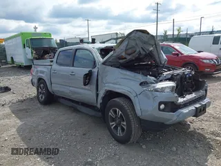 2019 Toyota Tacoma SR with VIN 3TMCZ5AN7KM205650, listed as a IAAI auction lot 42753052 with 54,746 mi miles and . Bid and sale history available at DreamBid. Image 1.