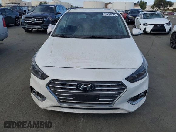 2018 Hyundai Accent Limited with VIN 3KPC34A35JE018975, listed as a Copart auction lot 74818524 with 57,063 mi miles and Salvage Title. Bid and sale history available at carsss.com. Image 5.