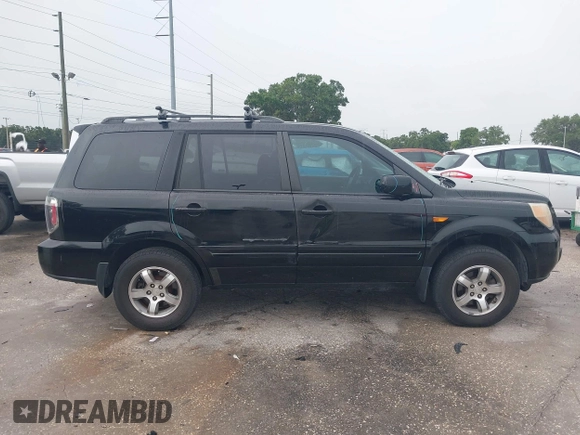 2007 Honda Pilot EX-L with VIN 5FNYF28577B028130, listed as a IAAI auction lot 42434714 with 179,299 mi miles and . Bid and sale history available at DreamBid. Image 13.