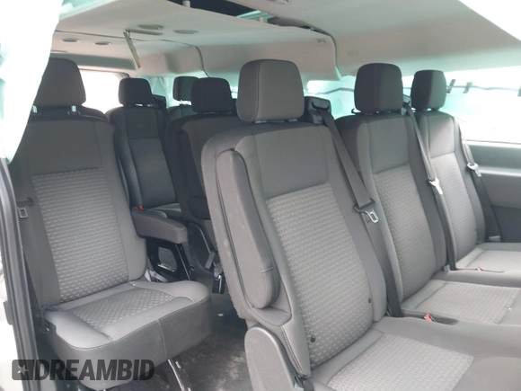 2023 Ford Transit Passenger XL with VIN 1FBAX2Y86PKB08759, listed as a IAAI auction lot 41879081 with 43,241 mi miles and . Bid and sale history available at DreamBid. Image 8.