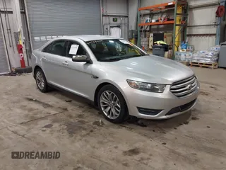2013 Ford Taurus Limited with VIN 1FAHP2F83DG116657, listed as a IAAI auction lot 41533075 with 124,649 mi miles. Bid and sale history available at carsss.com. Image 1.