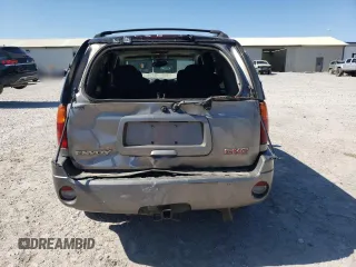 2005 GMC Envoy SLE с VIN 1GKDS13S852264341, выставлен на аукционе Copart как лот 49835015 с пробегом 178 401 миль миль и Списание • Salvage title. История ставок и продаж доступна на DreamBid. Изображение 6.