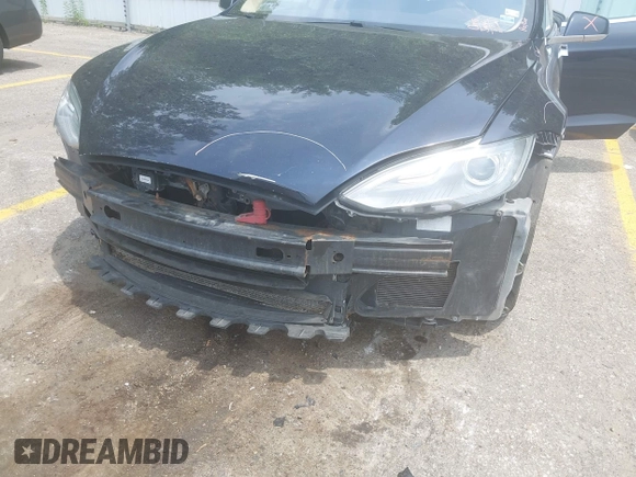 2013 Tesla Model S Performance z VIN 5YJSA1CP1DFP21827, wystawiony jako IAAI lot #42494897 z przebiegiem 148 150 mil mil oraz . Historia ofert i sprzedaży dostępna na DreamBid. Obrazek 6.