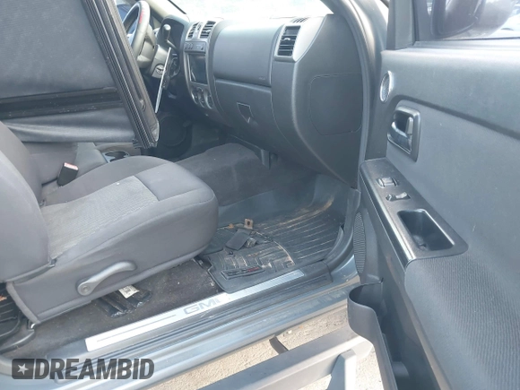 2012 GMC Canyon SLE1 with VIN 1GTH6MFE4C8128579, listed as a IAAI auction lot 42750181 with 250,960 mi miles and . Bid and sale history available at DreamBid. Image 5.