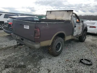 1999 Ford F-150 z VIN 1FTRF18W2XNA60279, wystawiony jako Copart lot #42998315 z przebiegiem Nie podano mil oraz Szkoda całkowita • Salvage title. Historia ofert i sprzedaży dostępna na DreamBid. Obrazek 3.