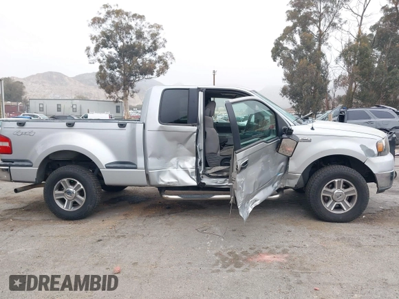 2005 Ford F-150 XLT z VIN 1FTPX04595KC18420, wystawiony jako IAAI lot #41493863 z przebiegiem 181 395 mil mil oraz . Historia ofert i sprzedaży dostępna na DreamBid. Obrazek 13.