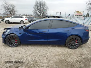 2021 Tesla Model 3 Performance with VIN 5YJ3E1EC6MF996743, listed as a IAAI auction lot 41509631 with 41,599 mi miles and . Bid and sale history available at DreamBid. Image 14.