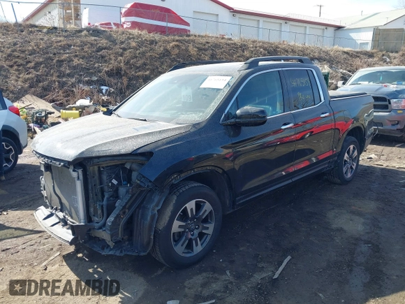 2019 Honda Ridgeline RTL-E with VIN 5FPYK3F7XKB014406, listed as a IAAI auction lot 41765154 with 65,209 mi miles and . Bid and sale history available at DreamBid. Image 18.