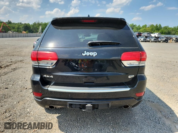 2017 Jeep Grand Cherokee Overland z VIN 1C4RJFCG4HC818132, wystawiony jako Copart lot #62642775 z przebiegiem 116 815 mil mil oraz Szkoda całkowita • Salvage title. Historia ofert i sprzedaży dostępna na DreamBid. Obrazek 6.