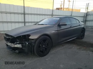 2014 BMW 6 Series 640i z VIN WBA6A0C58ED317424, wystawiony jako Copart lot #88008425 z przebiegiem 110 049 mil mil oraz Szkoda całkowita • Salvage title. Historia ofert i sprzedaży dostępna na DreamBid. Obrazek 1.