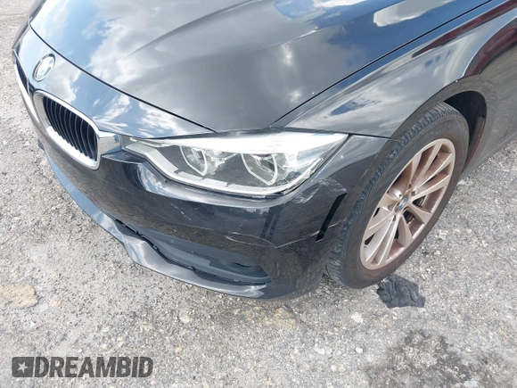 2018 BMW 3 Series 320i with VIN WBA8E1G57JNU88781, listed as a IAAI auction lot 42019246 with 56,820 mi miles. Bid and sale history available at carsss.com. Image 6.