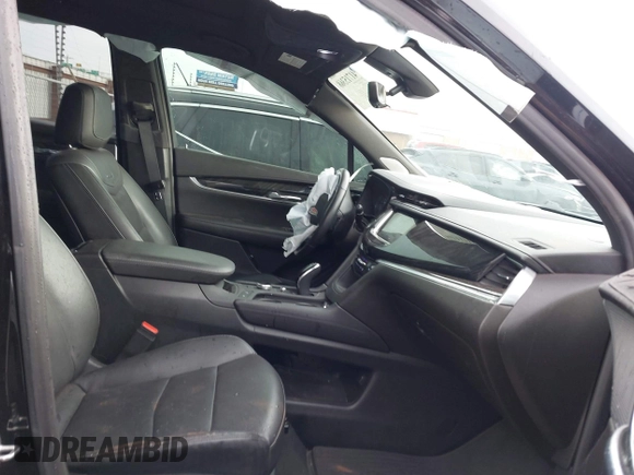 2021 Cadillac XT6 Premium Luxury z VIN 1GYKPDRS9MZ120150, wystawiony jako IAAI lot #41715368 z przebiegiem 47 835 mil mil oraz . Historia ofert i sprzedaży dostępna na DreamBid. Obrazek 5.