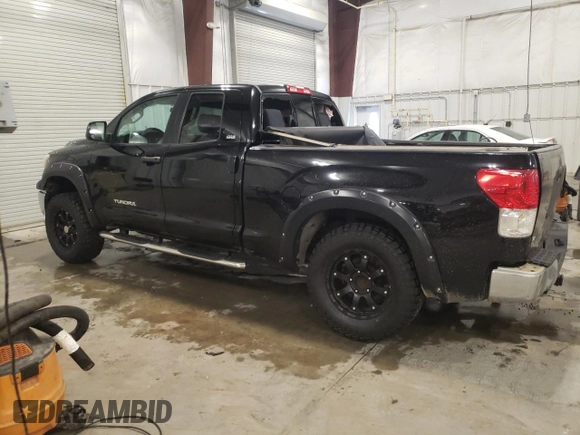 2010 Toyota Tundra 4WD Truck with VIN 5TFUM5F11AX006501, listed as a Copart auction lot 42424145 with 239,553 mi miles and Salvage Title. Bid and sale history available at carsss.com. Image 2.