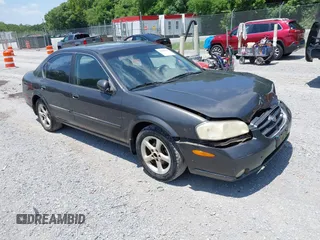 2000 Nissan Maxima GXE z VIN JN1CA31A7YT215858, wystawiony jako IAAI lot #42464820 z przebiegiem 323 560 mil mil oraz . Historia ofert i sprzedaży dostępna na DreamBid. Obrazek 1.
