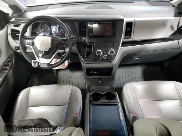 2015 Toyota Sienna XLE с VIN 5TDYK3DC9FS601304, выставлен на аукционе Copart как лот 51118295 с пробегом 153 121 миль миль и Списание • Salvage title. История ставок и продаж доступна на DreamBid. Изображение 8.