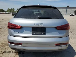 2018 Audi Q3 Premium z VIN WA1BCCFS3JR016890, wystawiony jako Copart lot #52594015 z przebiegiem 63 871 mil mil oraz Szkoda całkowita • Salvage title. Historia ofert i sprzedaży dostępna na DreamBid. Obrazek 6.