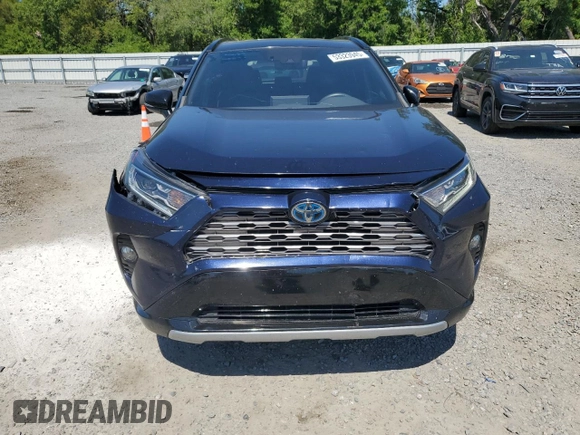 2021 Toyota RAV4 Hybrid XSE with VIN 2T3E6RFV9MW016128, listed as a Copart auction lot 53323945 with 134,009 mi miles and Salvage title. Bid and sale history available at DreamBid. Image 5.