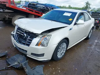 2012 Cadillac CTS Luxury with VIN 1G6DG5E57C0137409, listed as a IAAI auction lot 42633890 with 86,886 mi miles and . Bid and sale history available at DreamBid. Image 2.