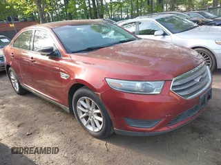 2014 Ford Taurus SE z VIN 1FAHP2D84EG128675, wystawiony jako IAAI lot #42136071 z przebiegiem 214 098 mil mil oraz . Historia ofert i sprzedaży dostępna na DreamBid. Obrazek 1.
