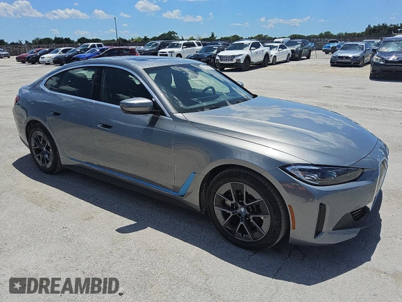 2024 BMW i4 eDrive40 z VIN WBY73AW02RFS99292, wystawiony jako Copart lot #56431405 z przebiegiem 17 030 mil mil oraz Tytuł czysty. Historia ofert i sprzedaży dostępna na DreamBid. Obrazek 4.