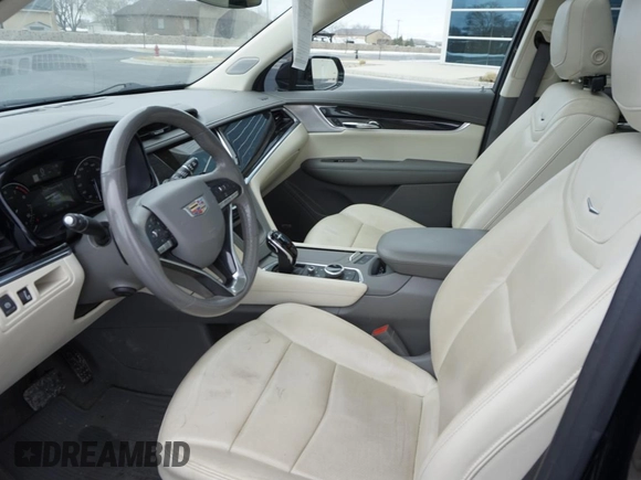 2021 Cadillac XT6 Premium Luxury z VIN 1GYKPDRS3MZ113033, wystawiony jako Copart lot #50076845 z przebiegiem 104 248 mil mil oraz Szkody całkowita. Historia ofert i sprzedaży dostępna na DreamBid. Obrazek 9.