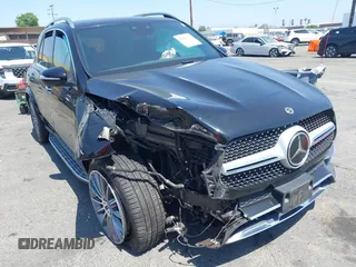 2021 Mercedes-Benz GLE 450 with VIN 4JGFB5KB1MA398430, listed as a IAAI auction lot 42606317 with 58,584 mi miles and . Bid and sale history available at DreamBid. Image 1.