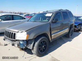 2005 Jeep Grand Cherokee Laredo with VIN 1J4HR48N35C647637, listed as a IAAI auction lot 38514345 with 167,342 mi miles. Bid and sale history available at carsss.com. Image 2.