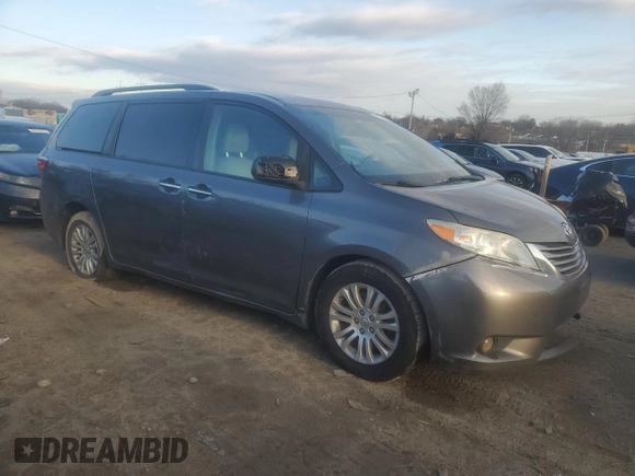2015 Toyota Sienna XLE with VIN 5TDYK3DC2FS573393, listed as a Copart auction lot 41769415 with 329,692 mi miles and Salvage Title. Bid and sale history available at carsss.com. Image 4.