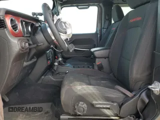 2023 Jeep Wrangler Rubicon with VIN 1C4HJXCG5PW652704, listed as a Copart auction lot 59762475 with 19,924 mi miles and Salvage title. Bid and sale history available at DreamBid. Image 7.