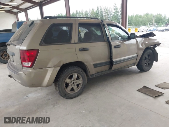 2005 Jeep Grand Cherokee Laredo with VIN 1J4GR48KX5C589625, listed as a IAAI auction lot 42699102 with Not provided miles and . Bid and sale history available at DreamBid. Image 4.