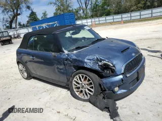 2010 MINI Convertible S z VIN WMWMS3C55ATY09138, wystawiony jako Copart lot #49045585 z przebiegiem 74 728 mil mil oraz Szkoda całkowita • Salvage title. Historia ofert i sprzedaży dostępna na DreamBid. Obrazek 4.